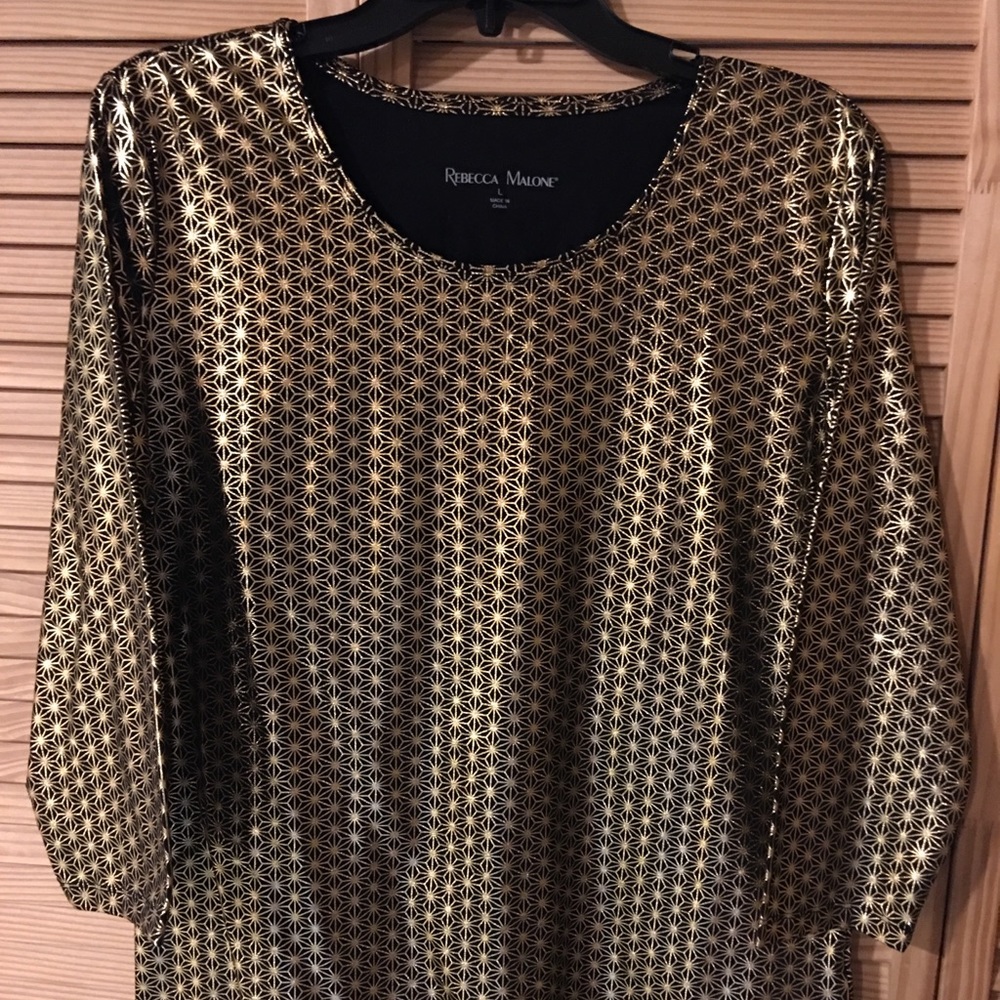 Rebecca Malone Dress up any outfit with this top.